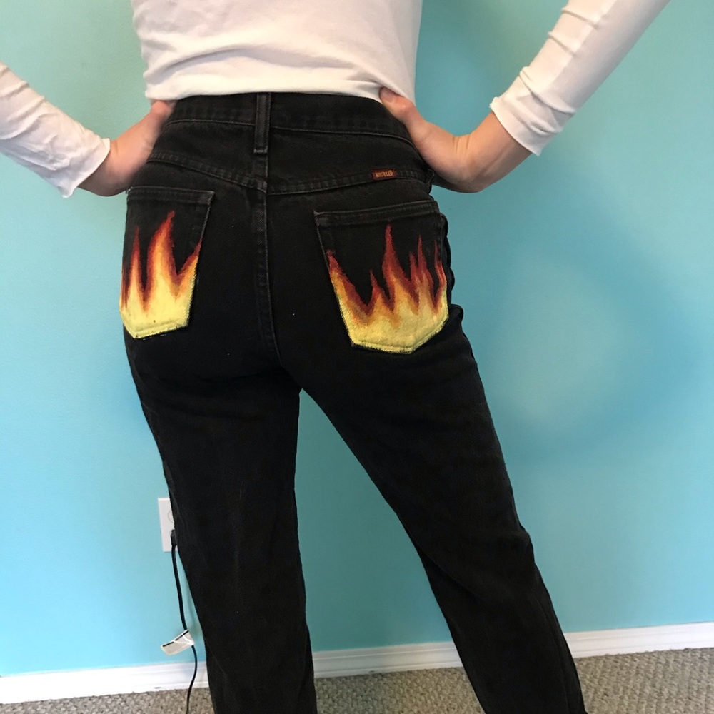 Rustler Black Mom jeans with hand painted flames.